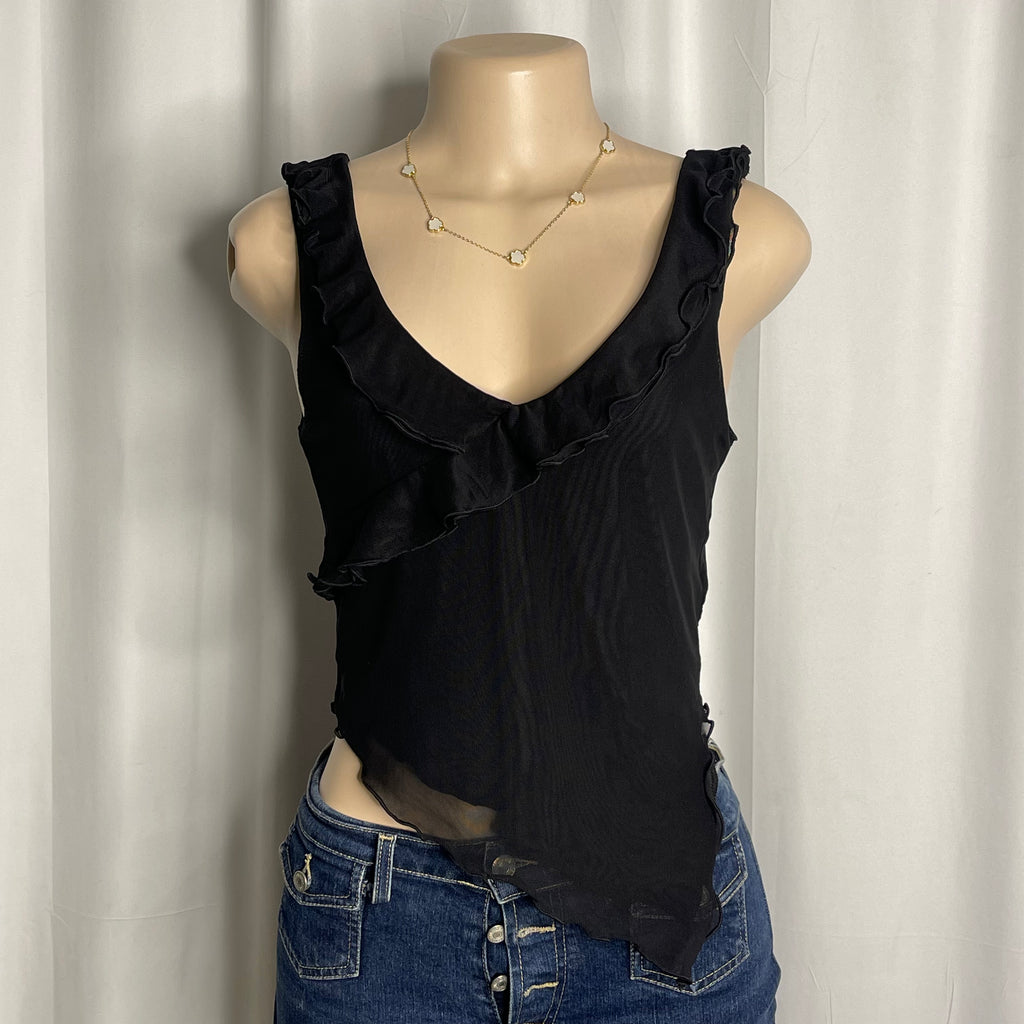 Black v-neck short blouse with ruffled trim and sheer asymmetrical hem