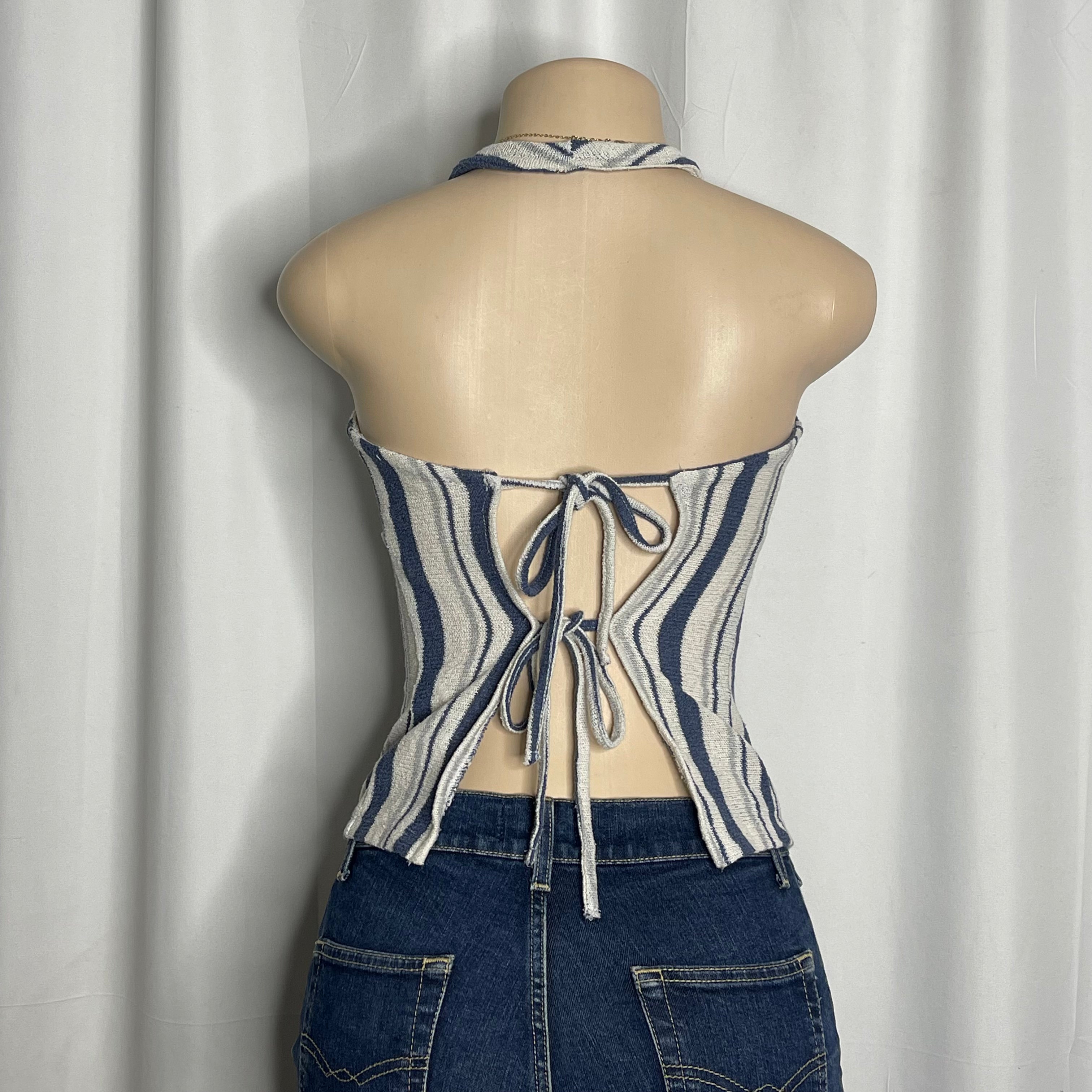 Striped halter neck top crafted in a textured light knit fabric