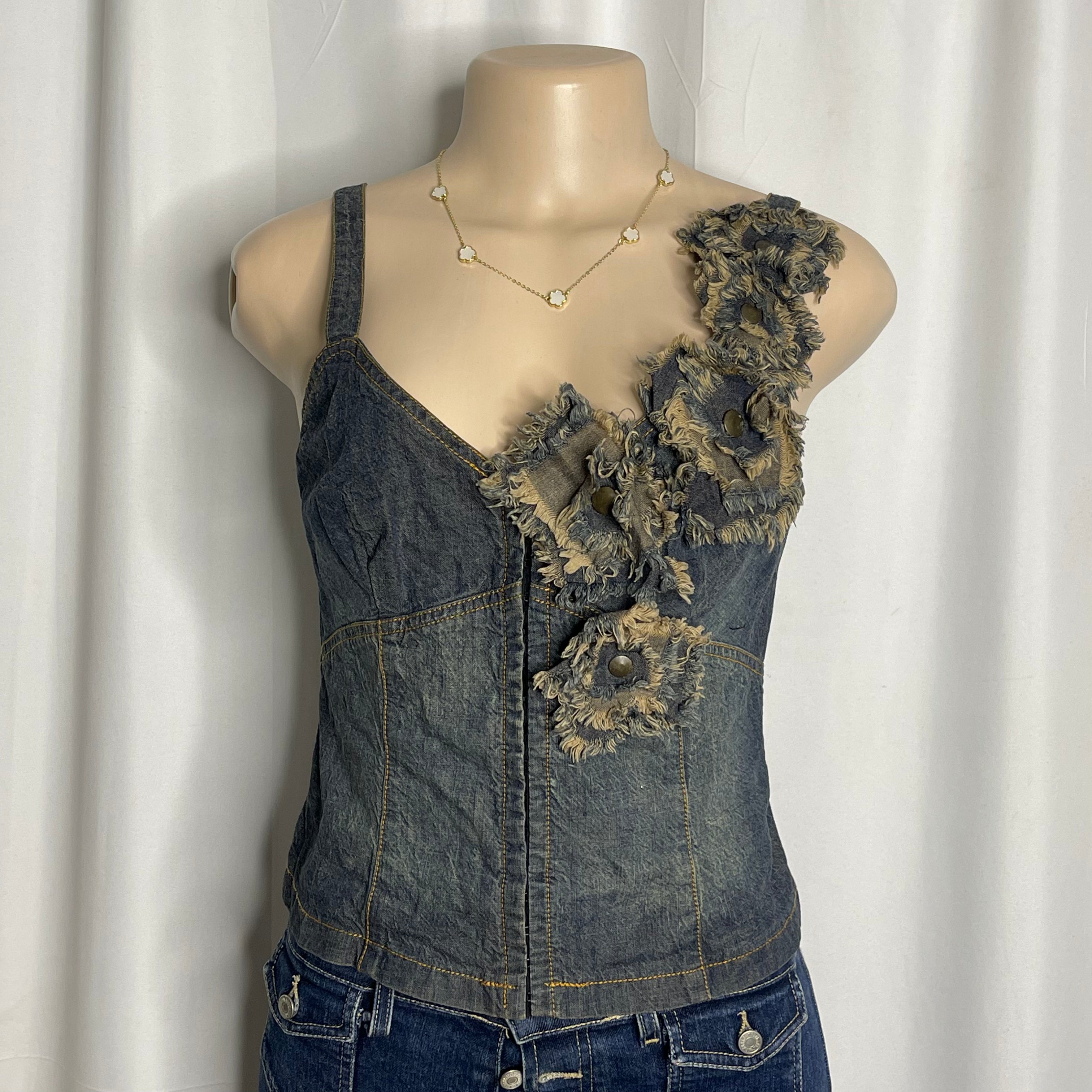 Distressed denim floral corset top with frayed rosette detailing