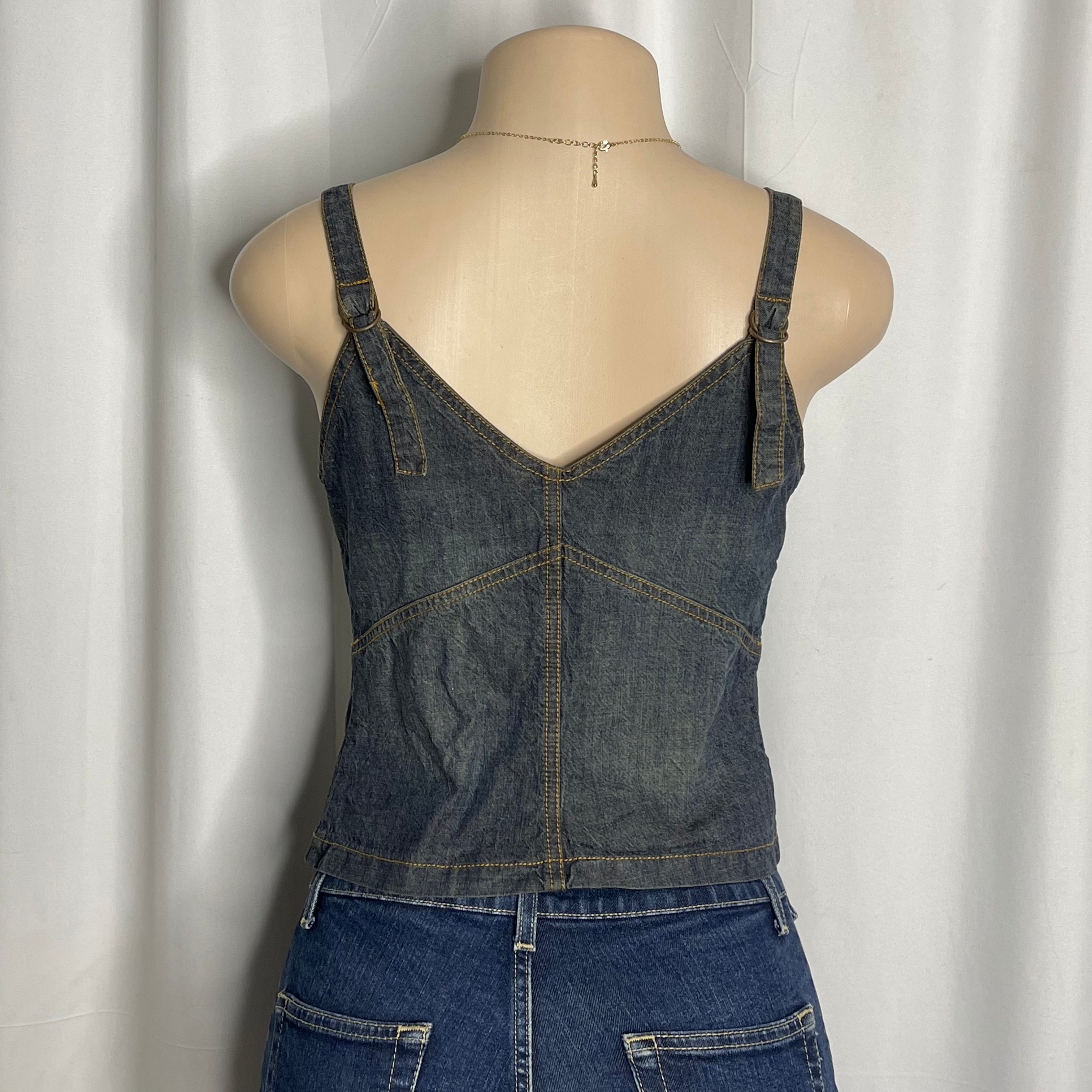 Distressed denim floral corset top with frayed rosette detailing