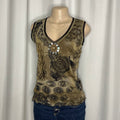 Olive green sleeveless mesh blouse with a decorative brooch