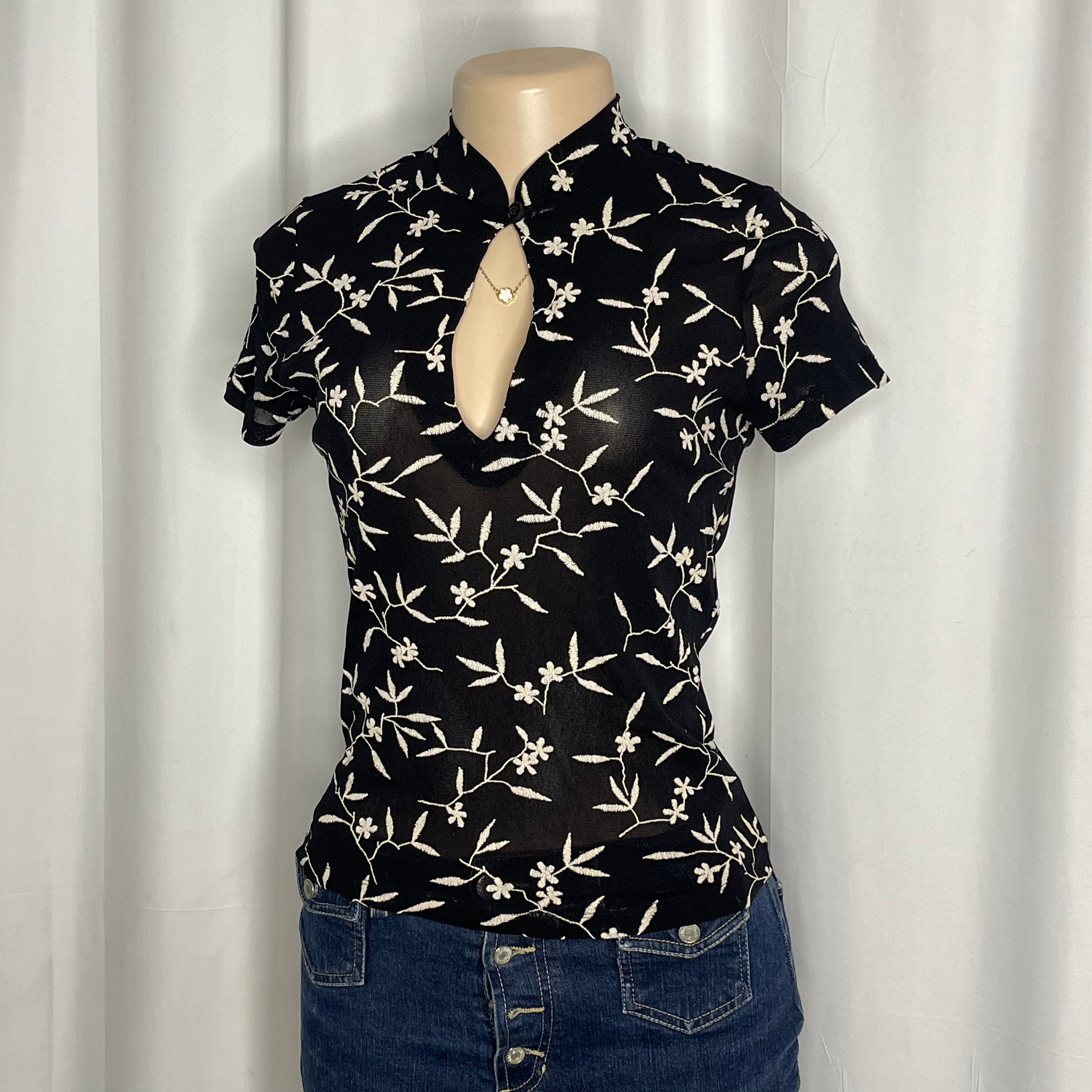Chinese-style black embroidered mesh top and a keyhole cut out
