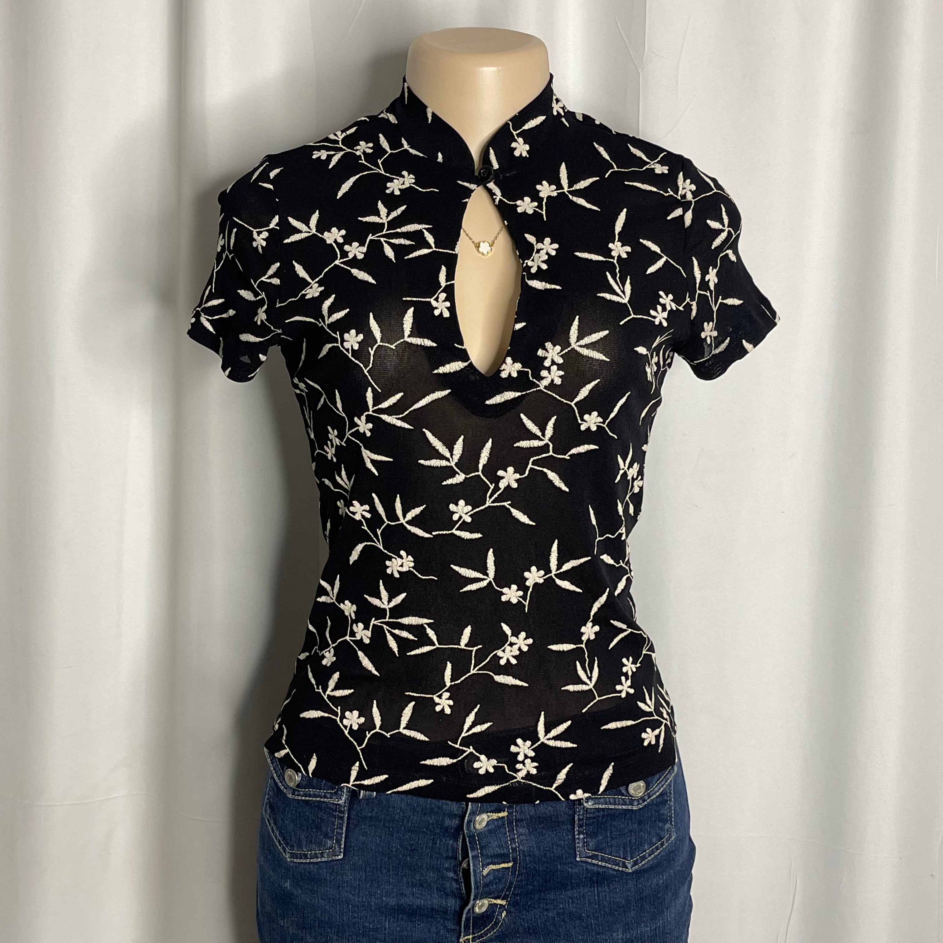 Chinese-style black embroidered mesh top and a keyhole cut out