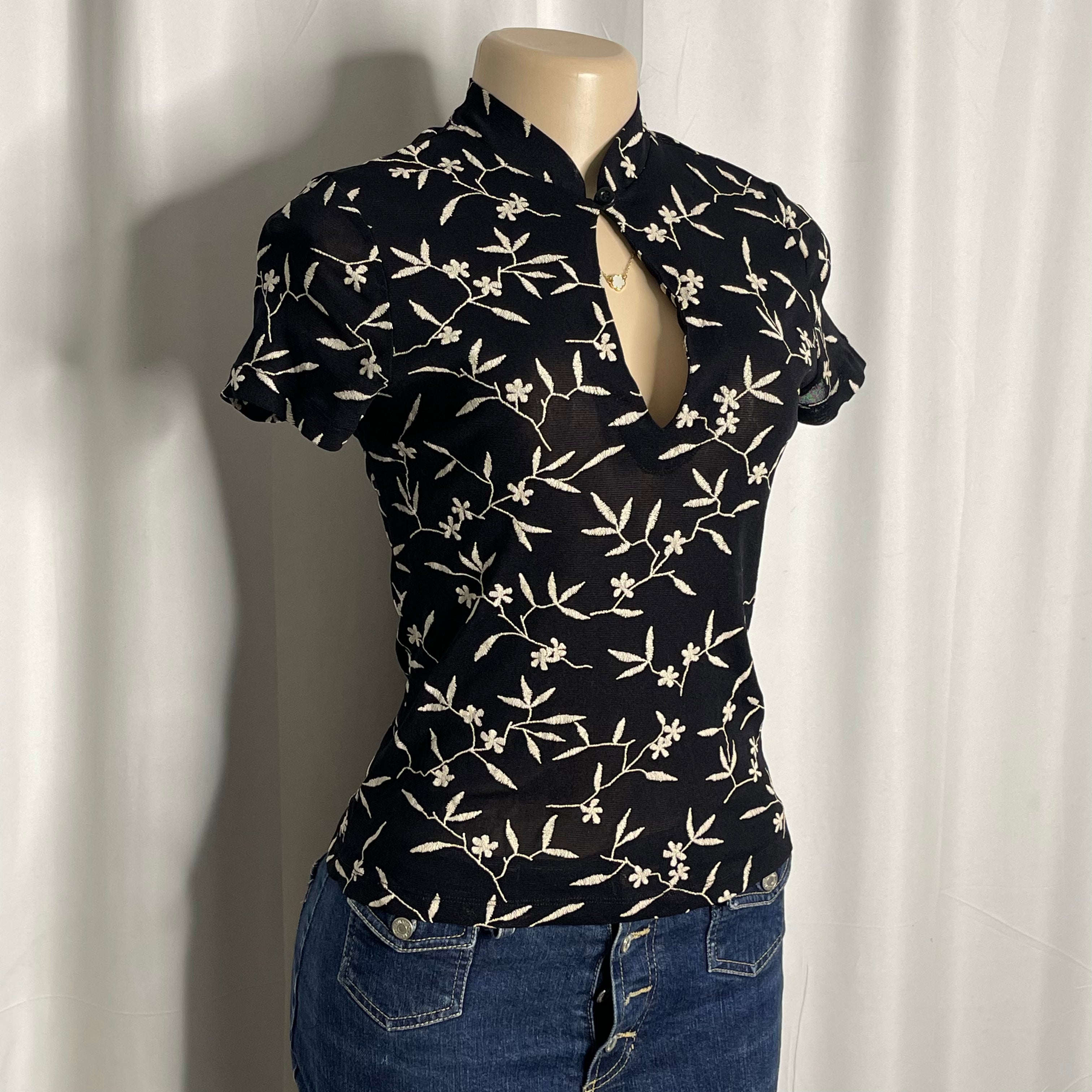 Chinese-style black embroidered mesh top and a keyhole cut out