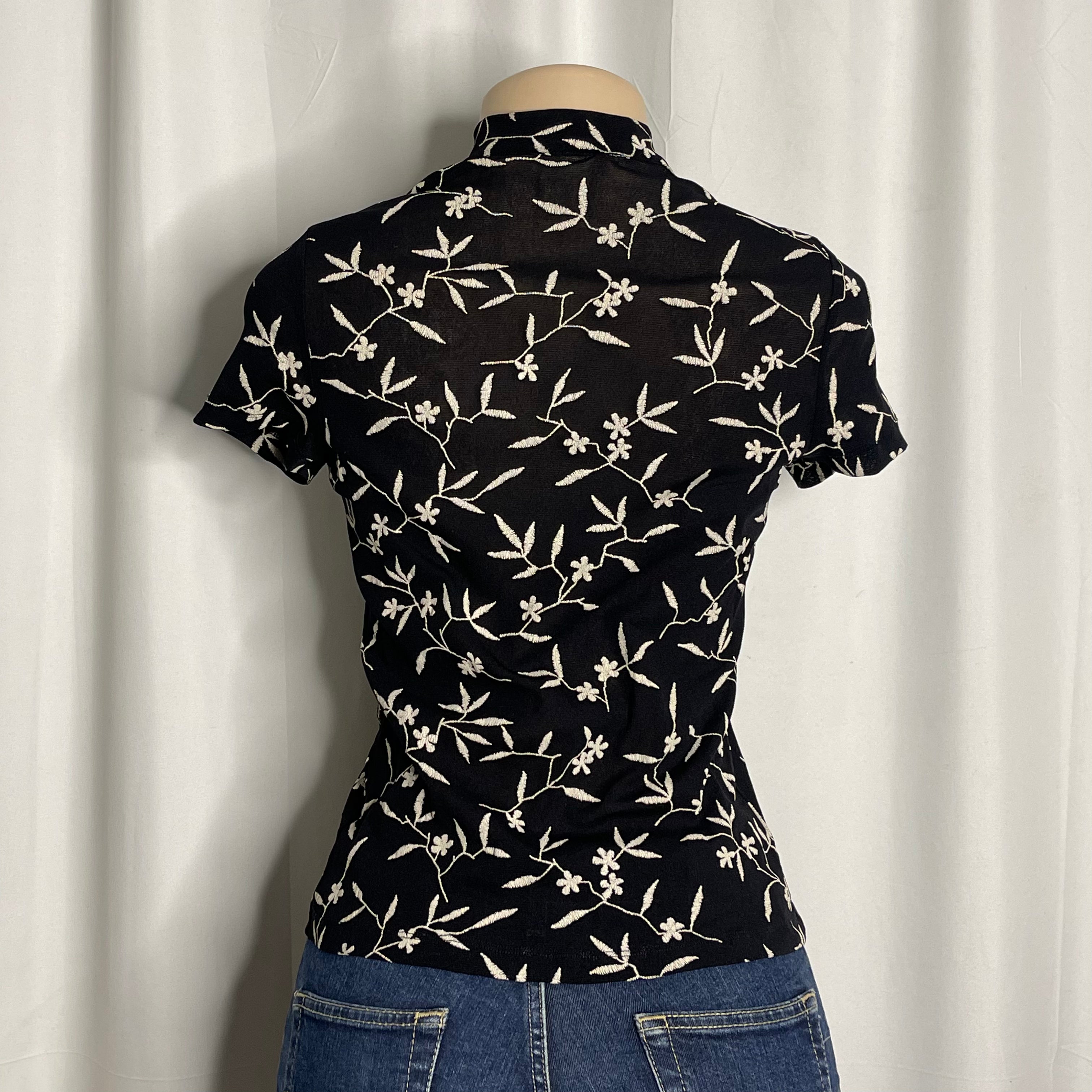 Chinese-style black embroidered mesh top and a keyhole cut out