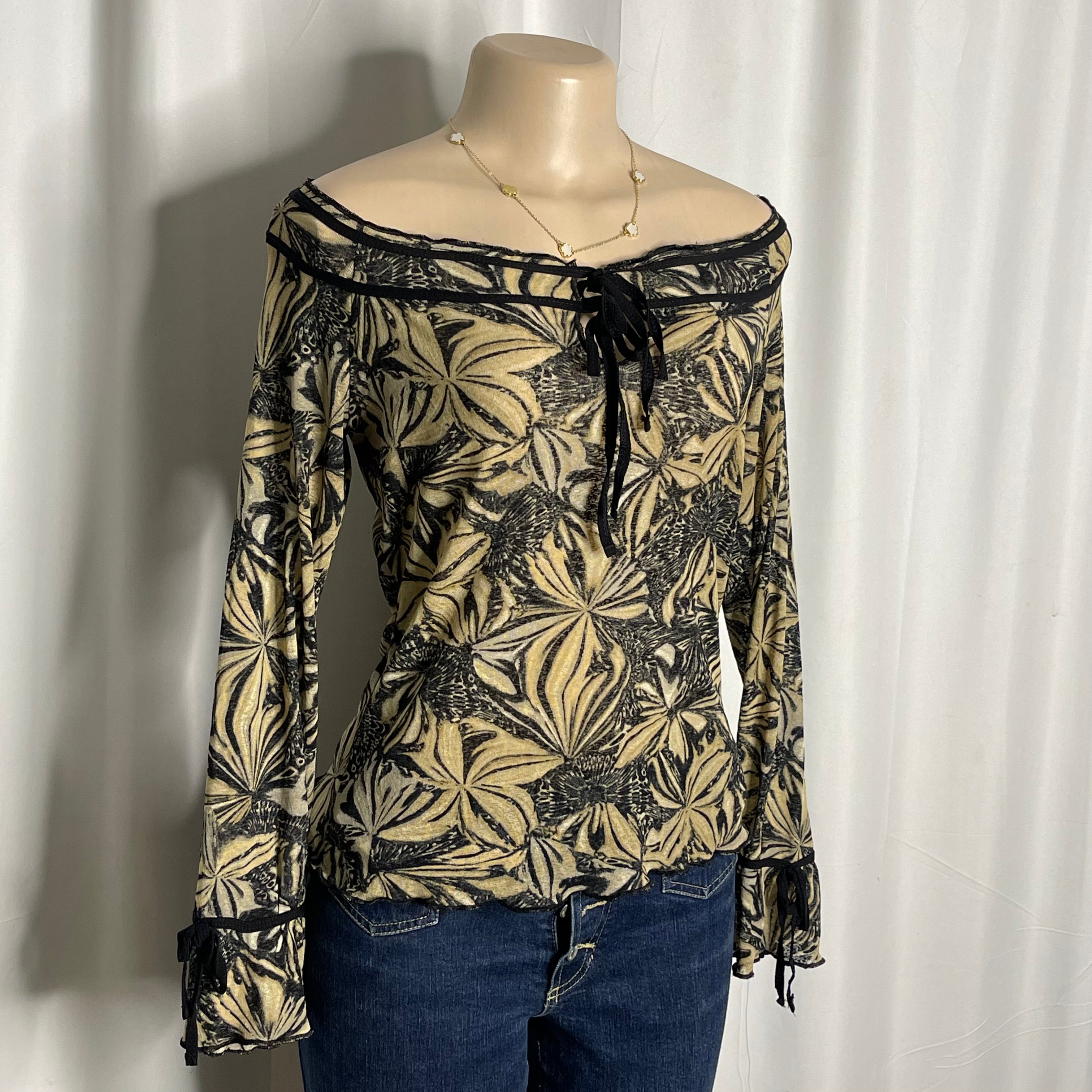 Y2K-style off the shoulder mesh blouse, abstract floral print with front tie neckline and trumpet/bell sleeves