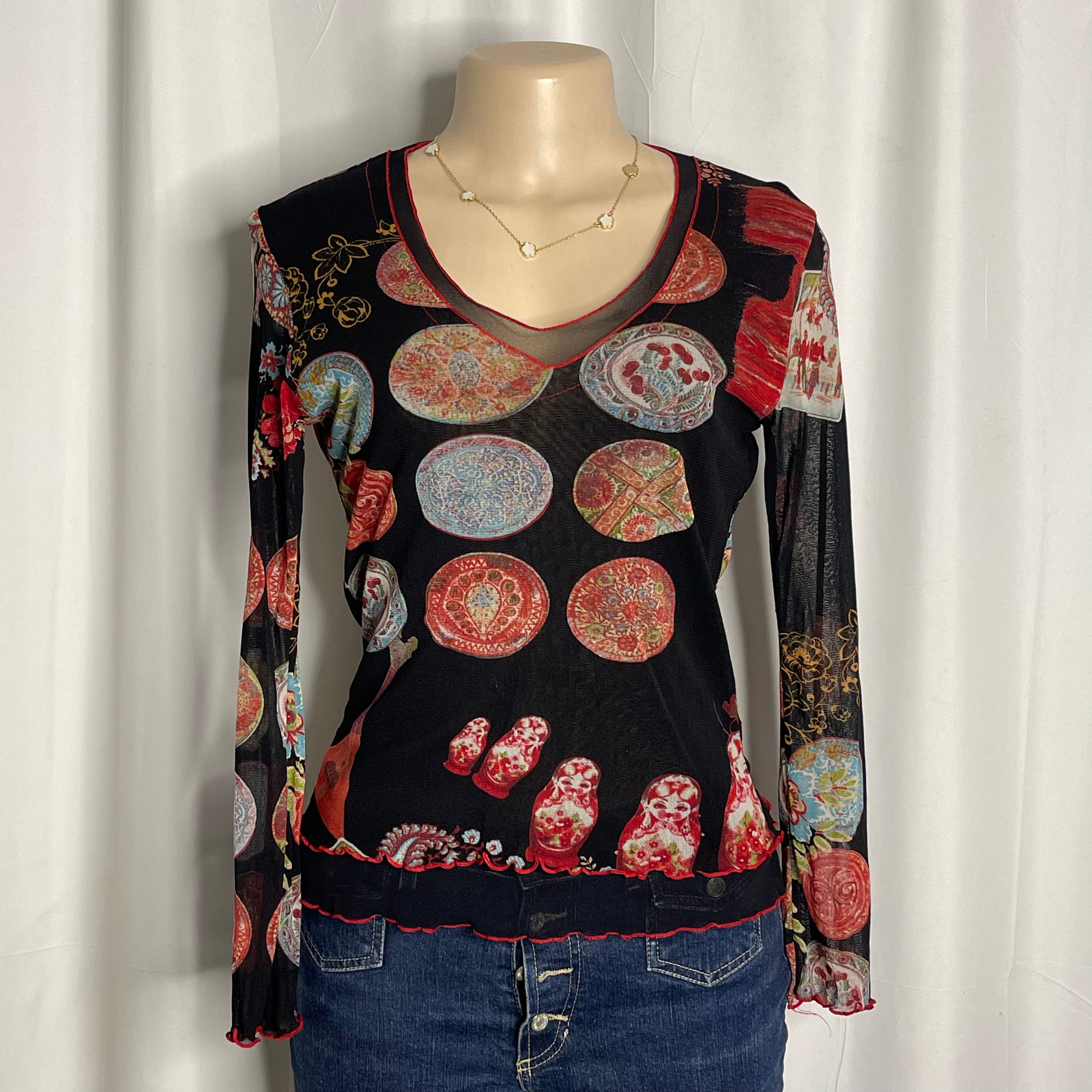 Vintage mesh long sleeves top with a russian nesting dolls graphic print