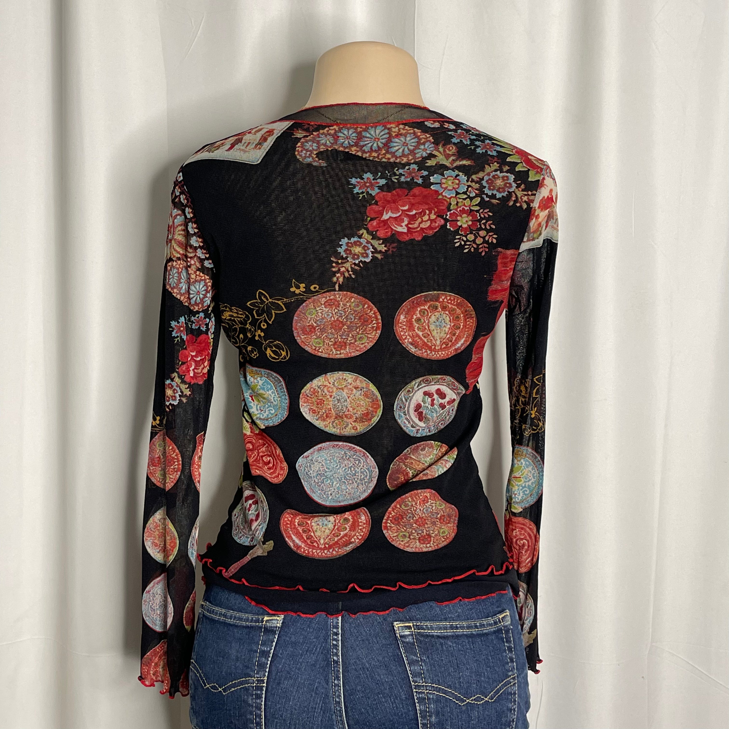 Vintage mesh long sleeves top with a russian nesting dolls graphic print
