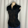 Sleeveless cotton shirt featuring artistic embroidered tee and graphic designs