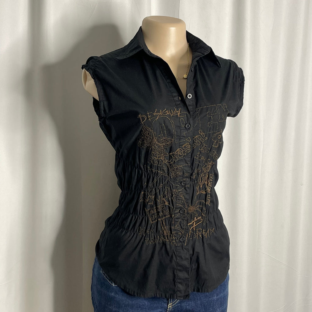 Sleeveless cotton shirt featuring artistic embroidered tee and graphic designs