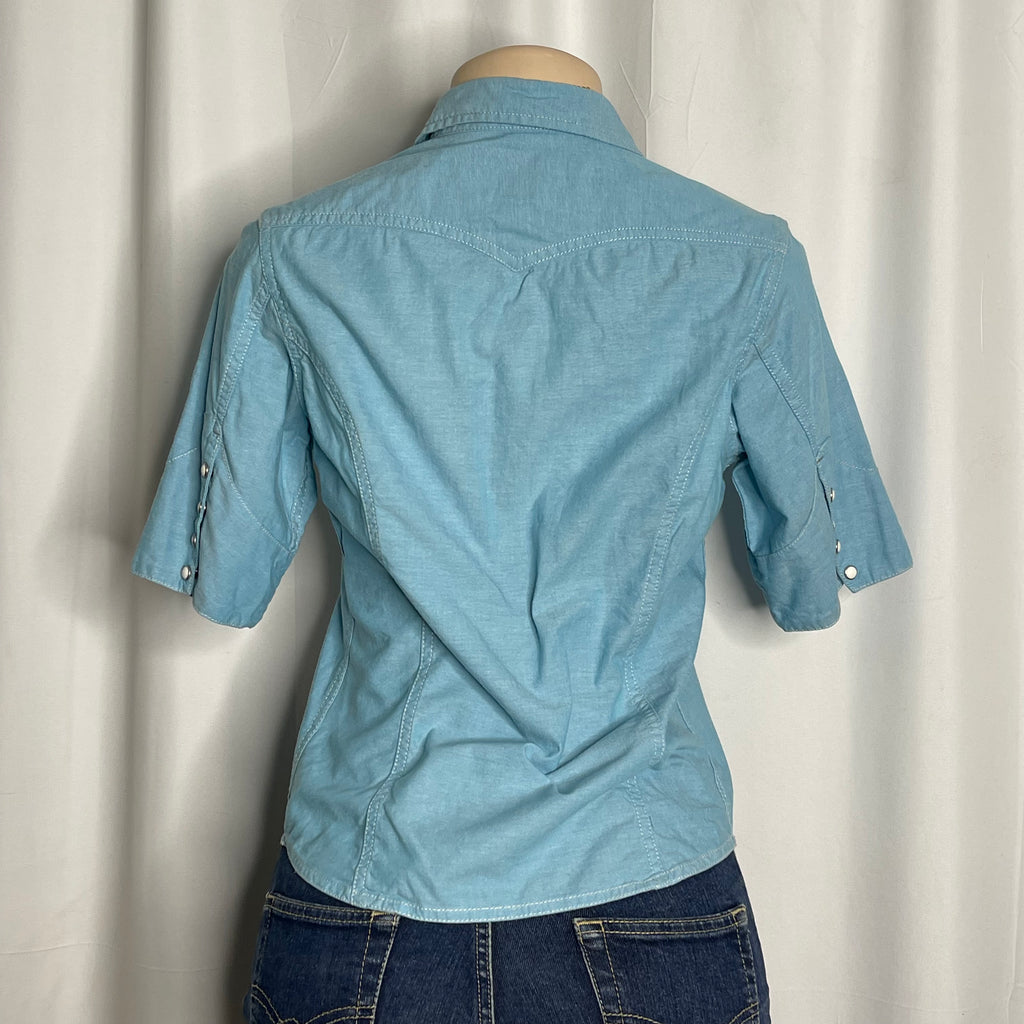 Light blue cotton shirt with a pearl snap buttons