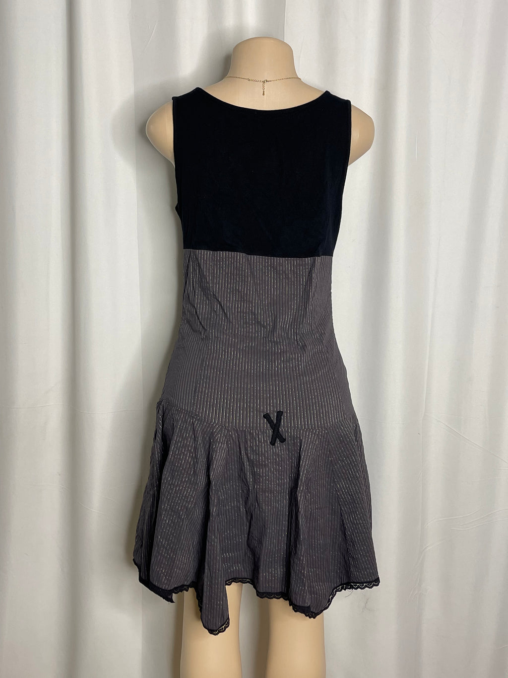 Vintage Y2K-era flared sleeveless mini dress