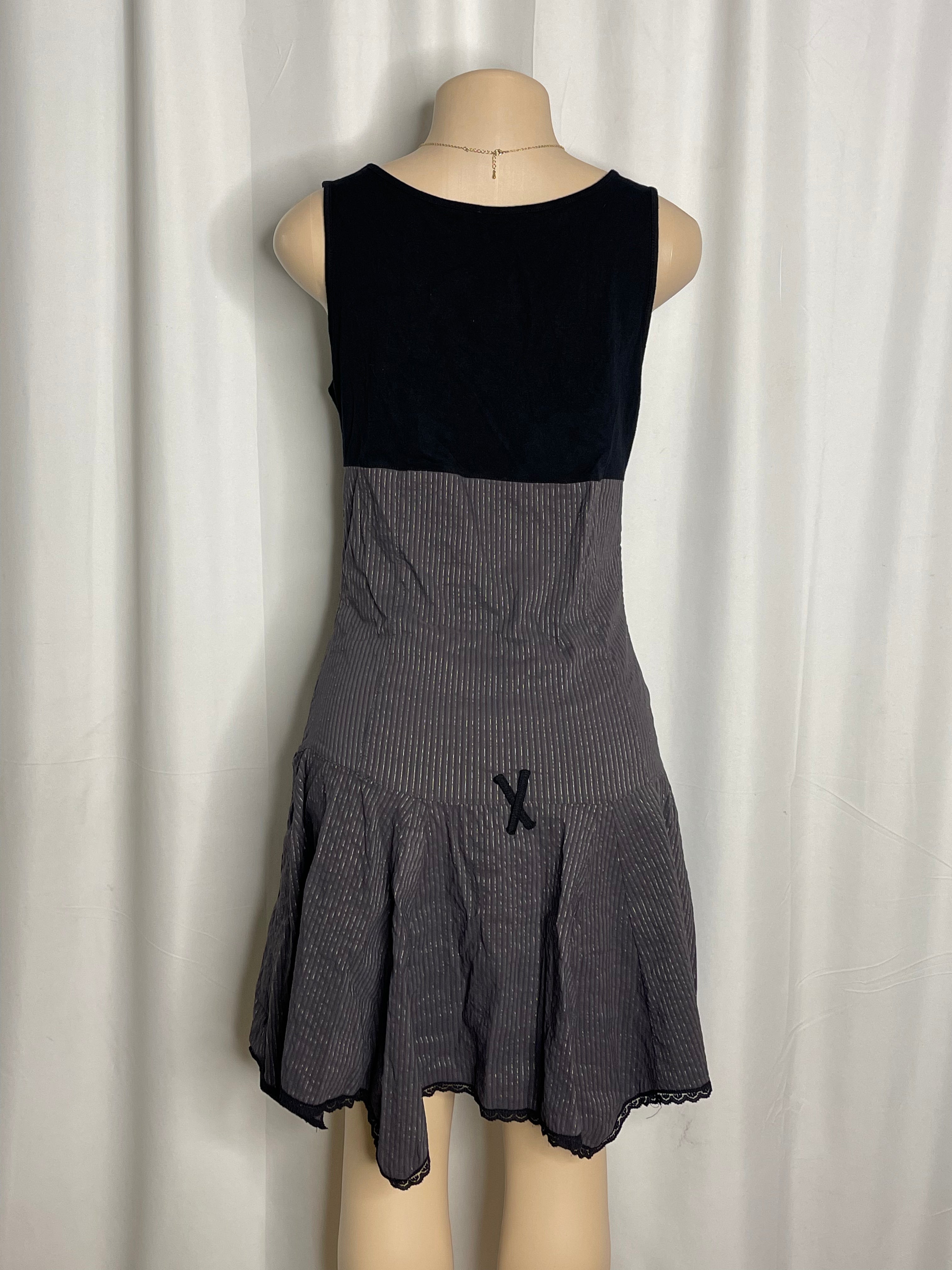 Vintage Y2K-era flared sleeveless mini dress