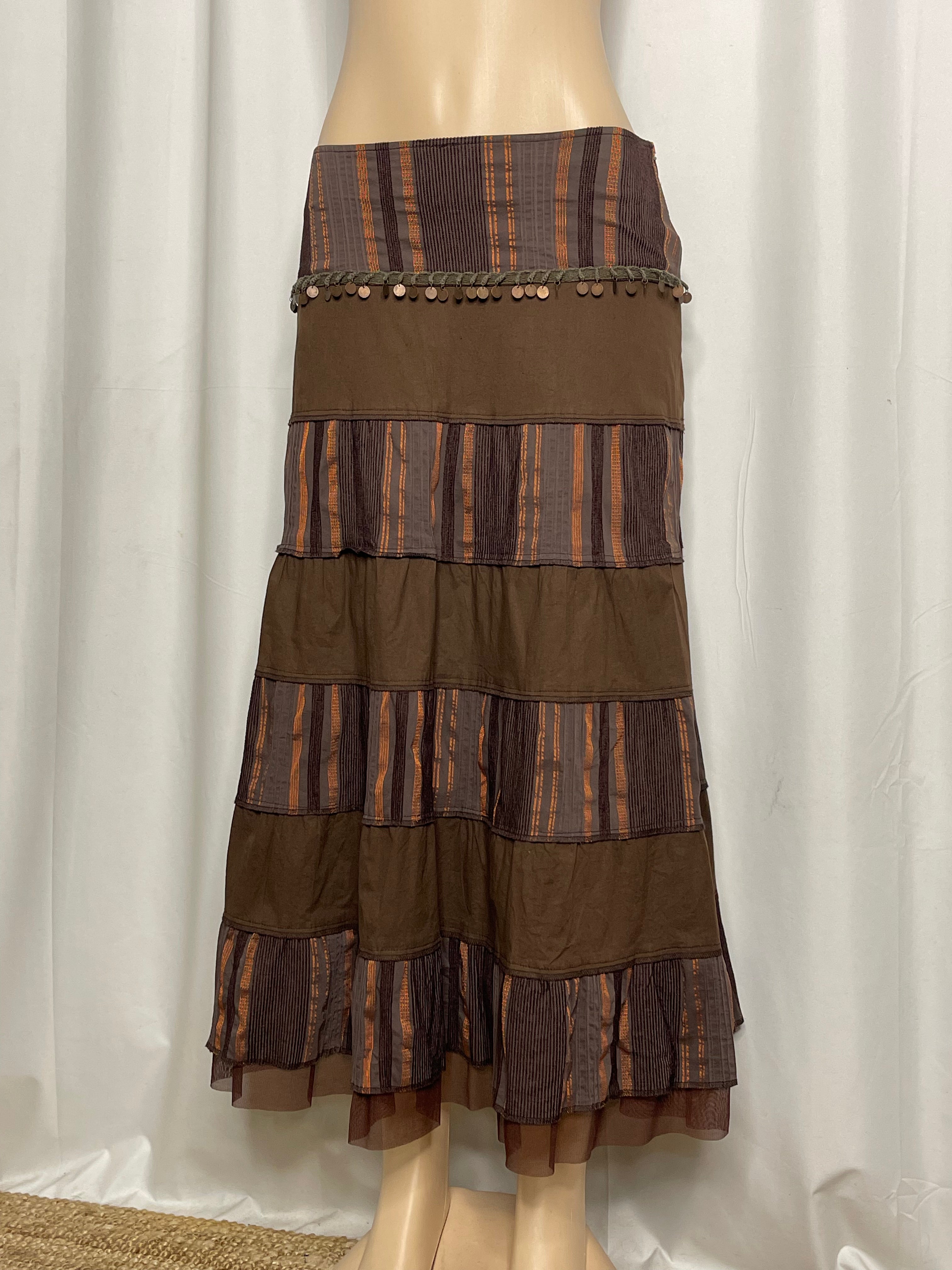 Brown and orange striped tiered maxi skirt with coin embellishments