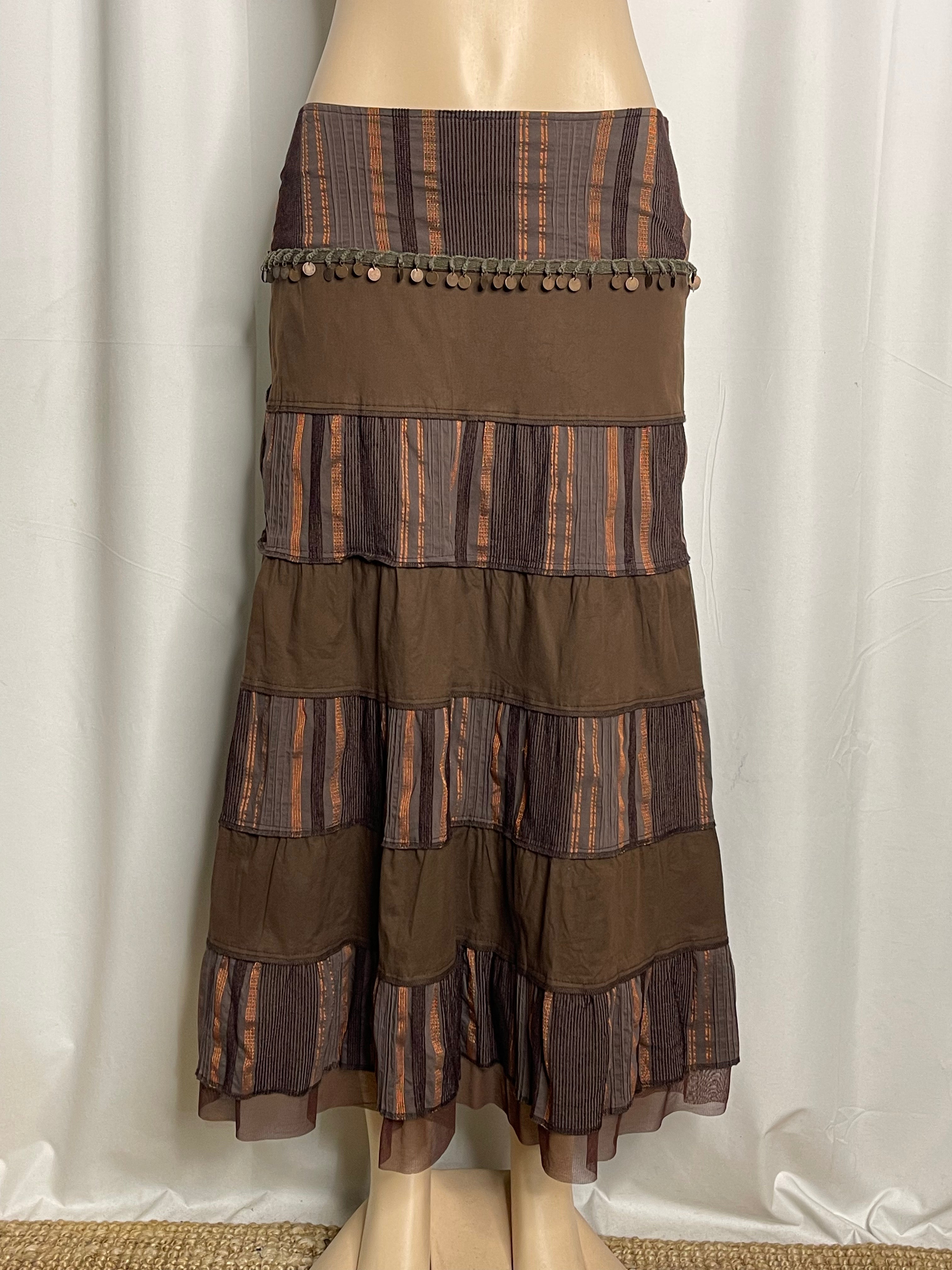 Brown and orange striped tiered maxi skirt with coin embellishments
