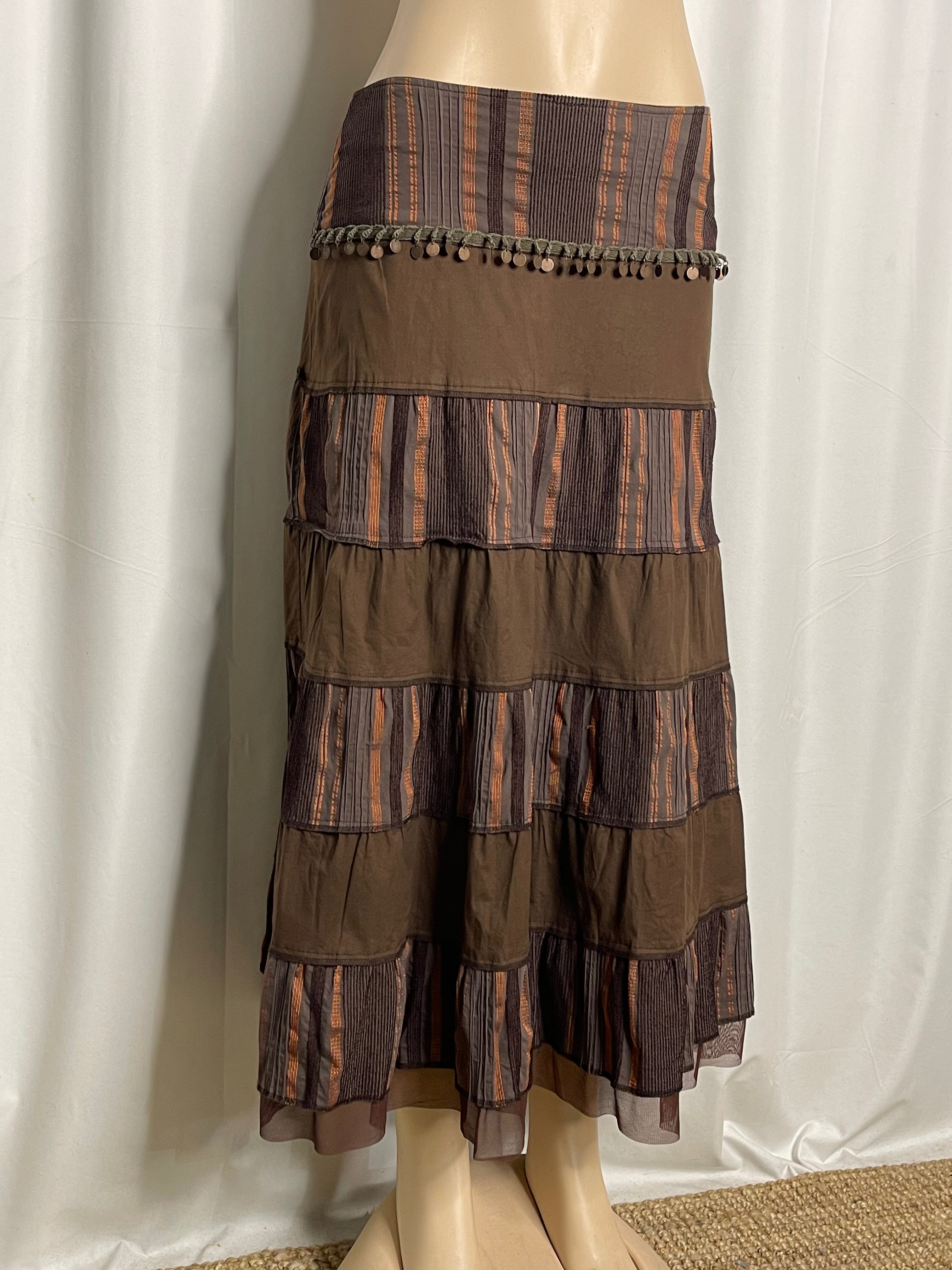 Brown and orange striped tiered maxi skirt with coin embellishments
