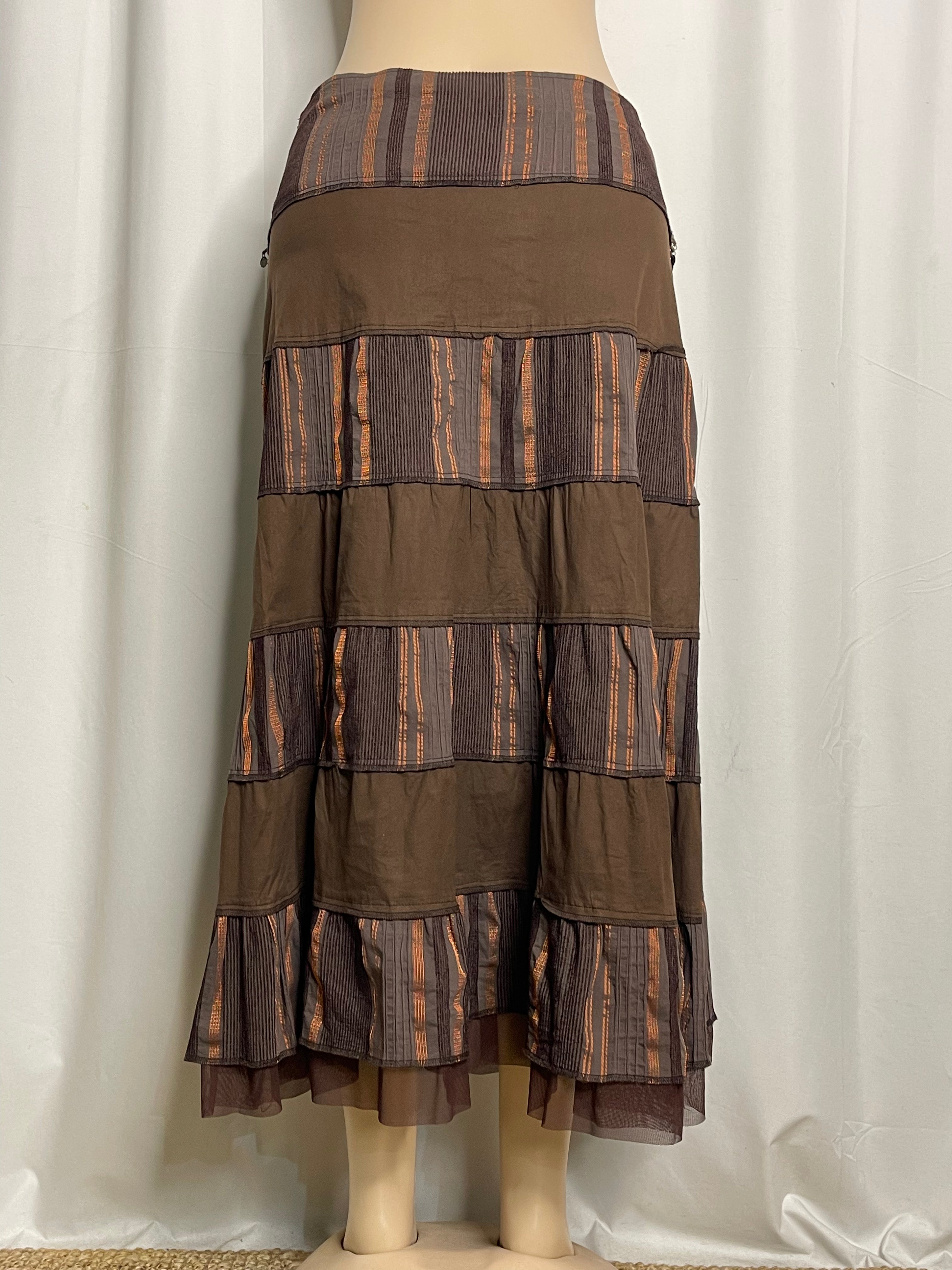 Brown and orange striped tiered maxi skirt with coin embellishments
