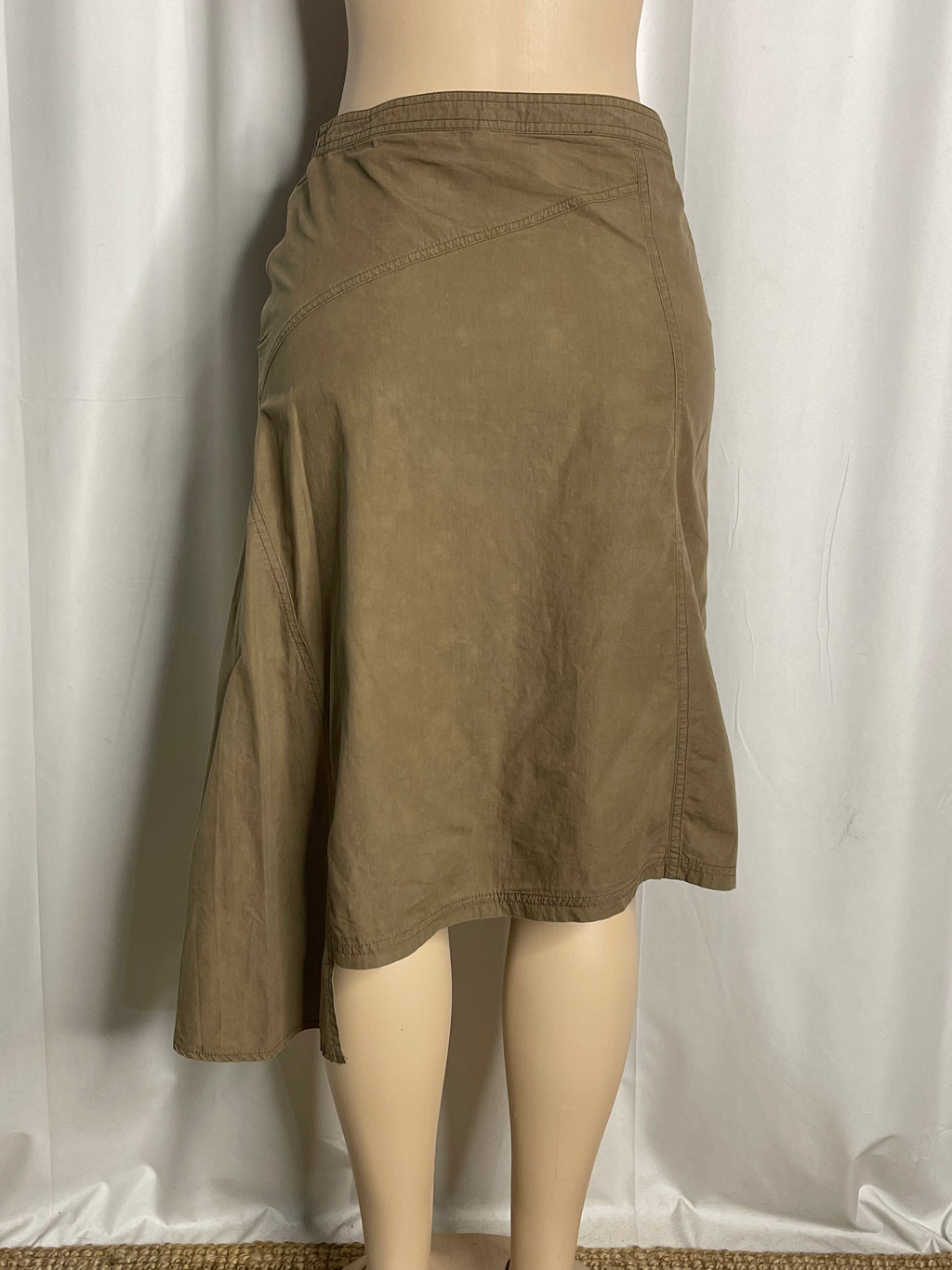 Olive green knee length cargo-style asymmetrical skirt
