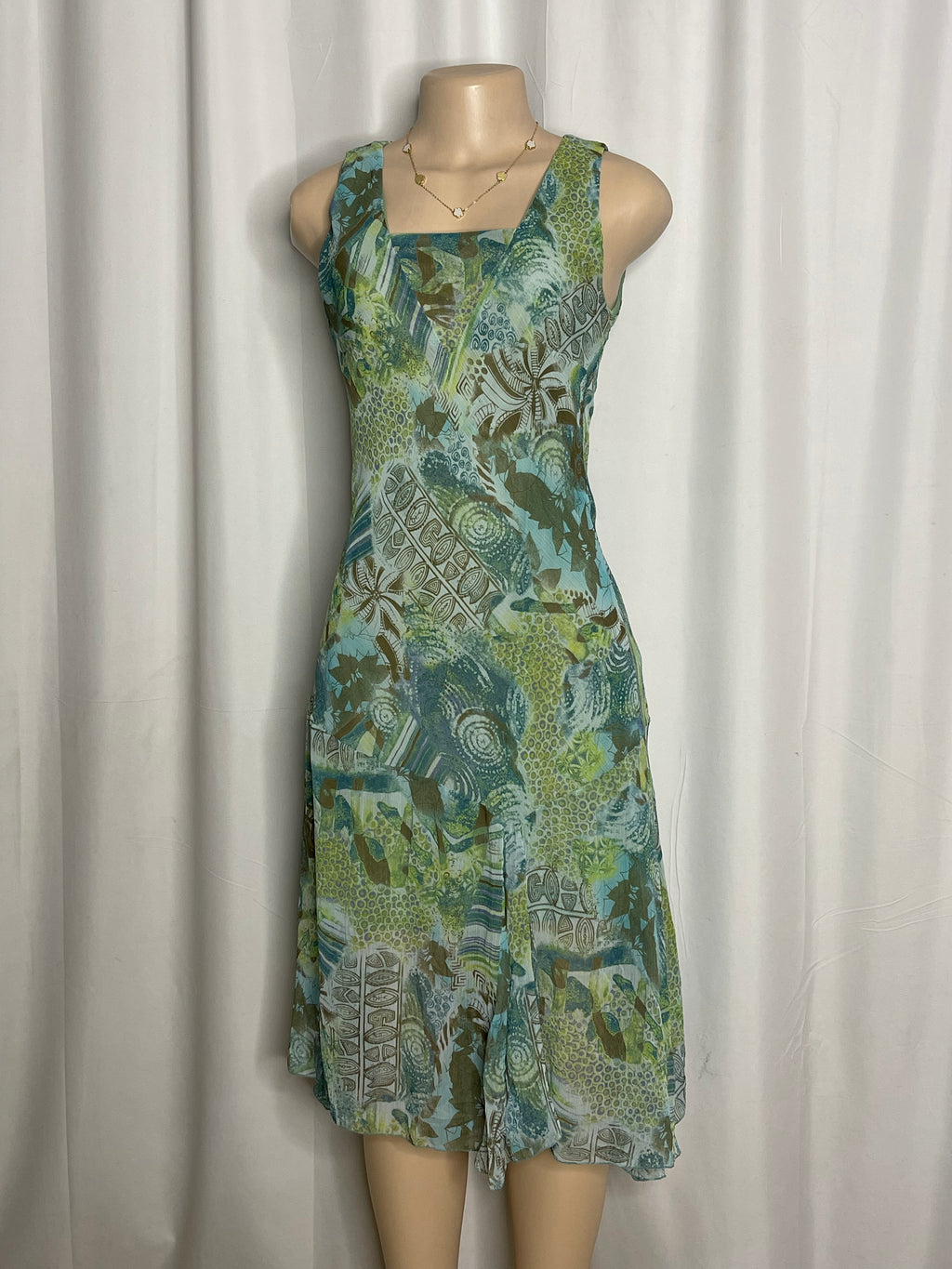 Knee length sleeveless summer dress green and blue pattern design