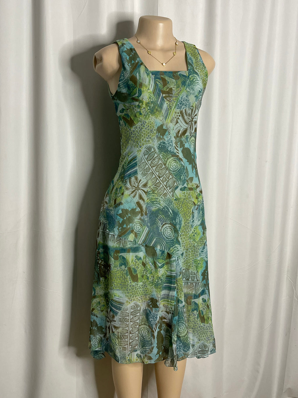 Knee length sleeveless summer dress green and blue pattern design
